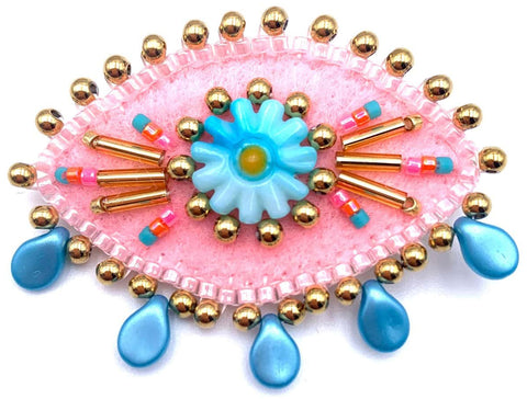 BROCHE OEIL ROSE